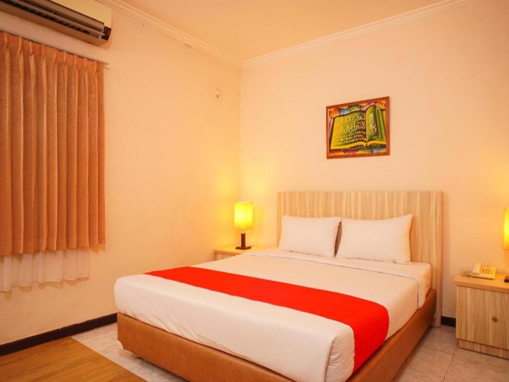 โอโย 142 โฮเต็ล อัลฟูร์กอน ชาเรียะฮ์ Hotel ปาเลมบัง ภายนอก รูปภาพ
